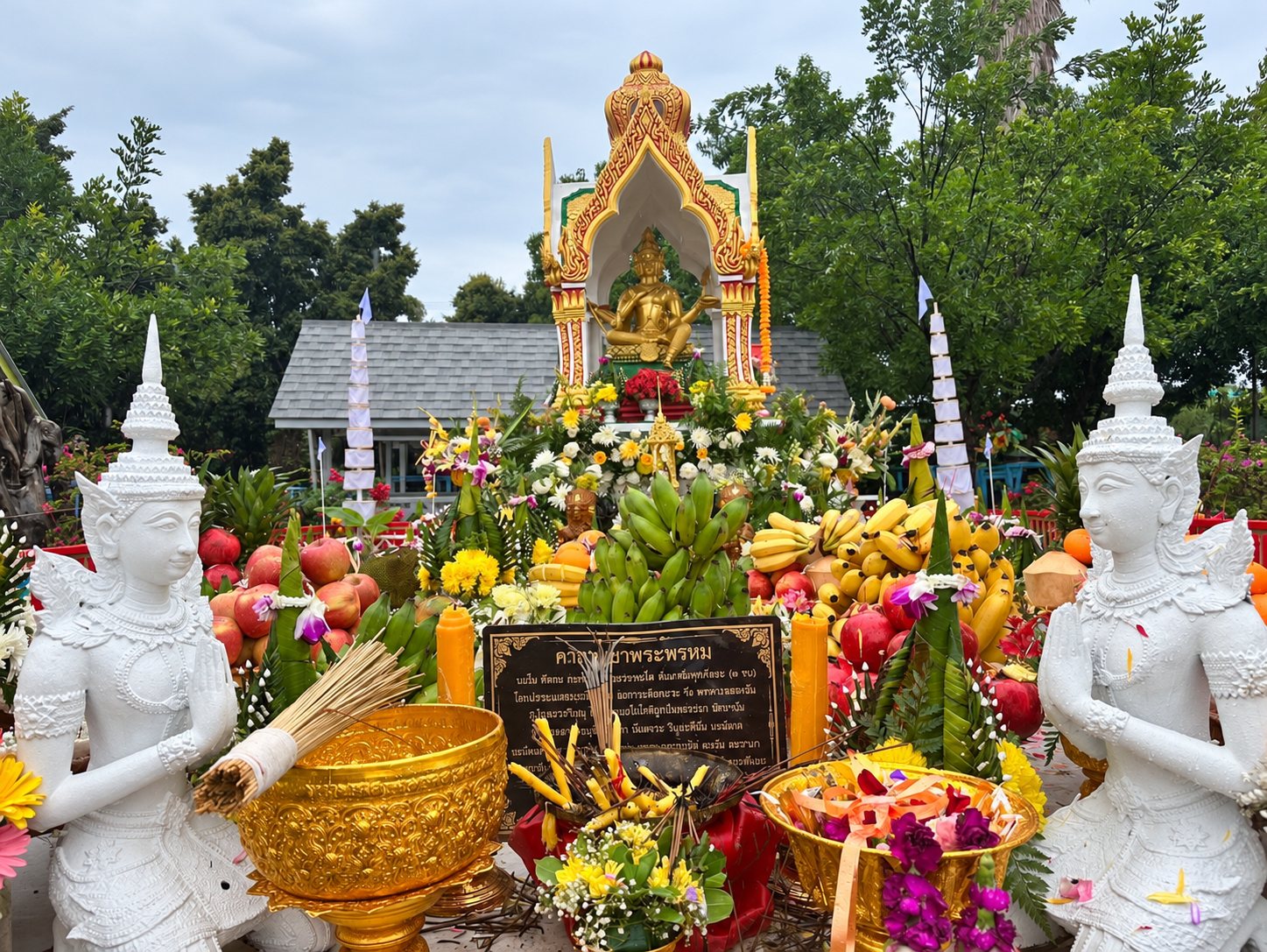 Offerings at the Brahma shrine